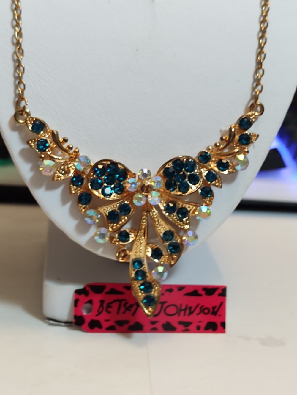Betsey Johnson Bow Statement Necklace with Teal and Iridescent Stones